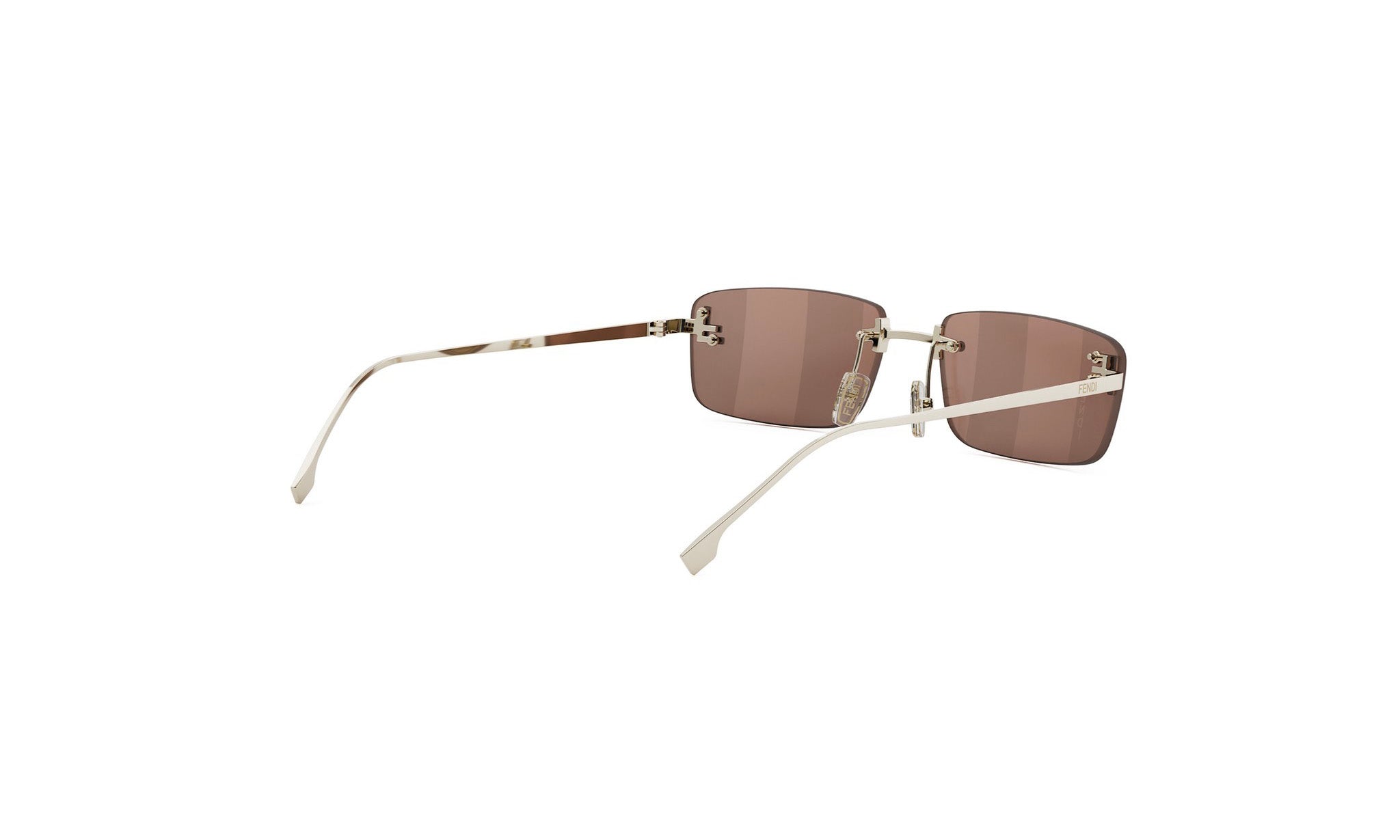 A pair of brown-tinted rectangular sunglasses with a white frame, positioned on a white background.