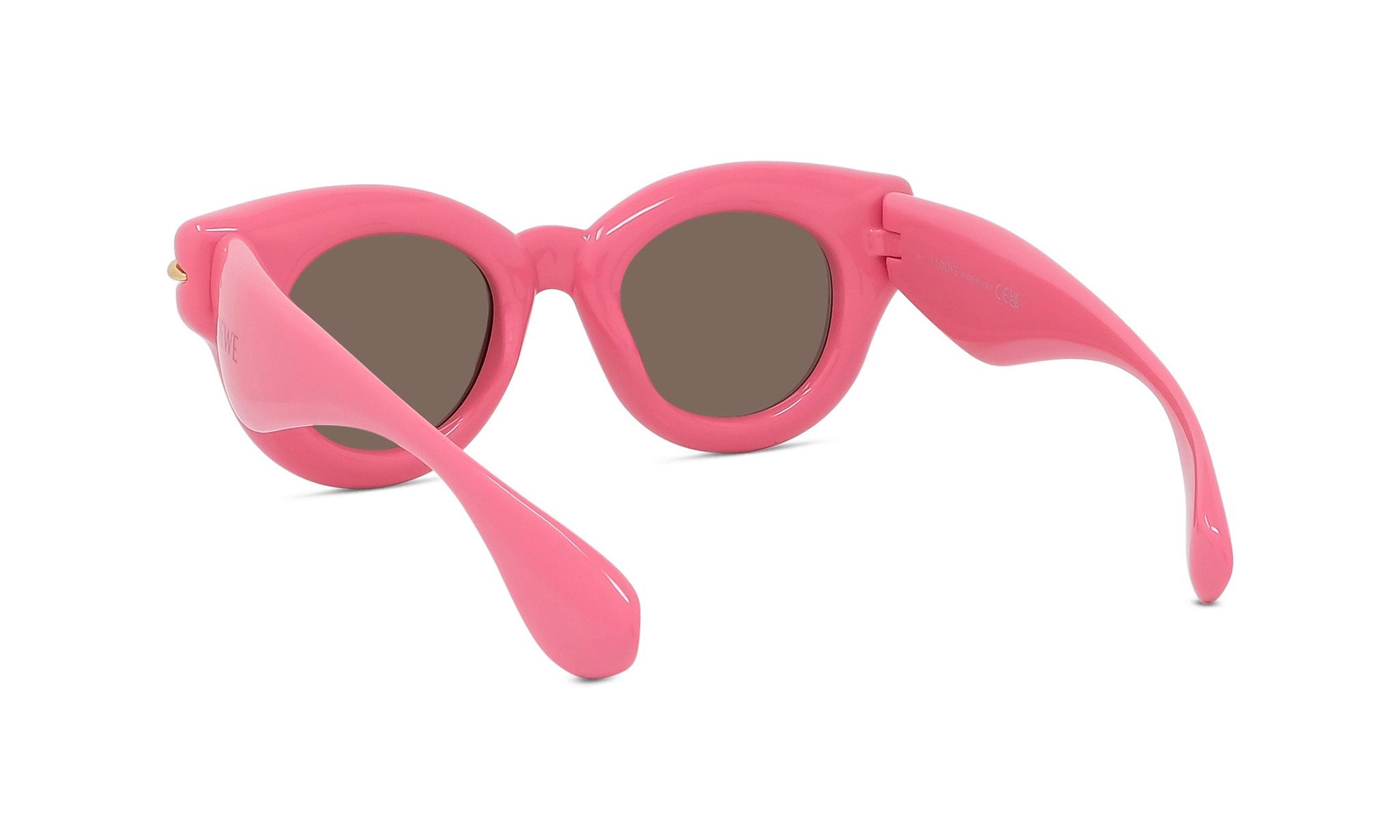 A pair of pink sunglasses with dark lenses.