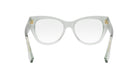 A pair of clear, white-framed glasses with gold accents.