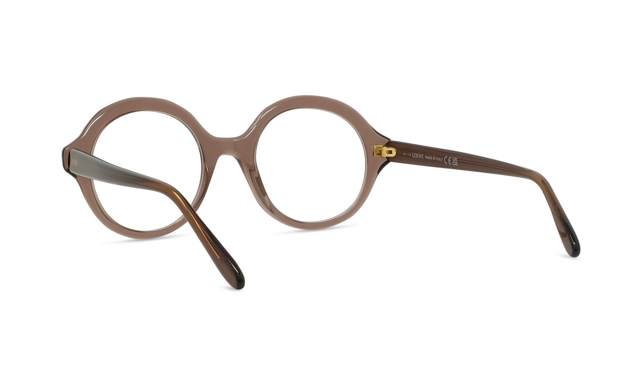 A pair of brown-framed glasses with a round lens, positioned facing towards the viewer.