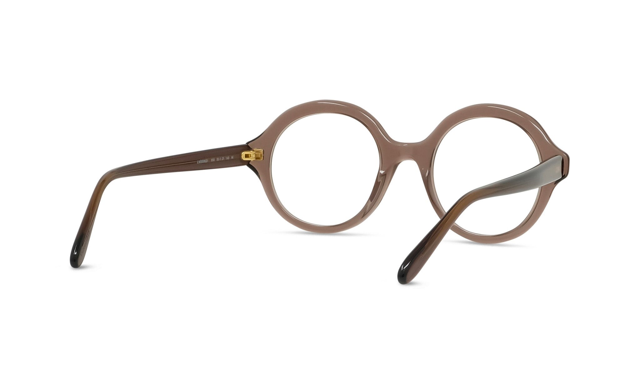 A pair of brown-framed glasses with a round lens, positioned facing away from the camera.