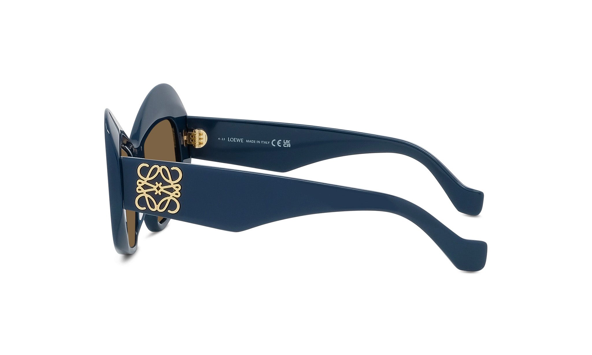 A pair of blue sunglasses with gold accents and a logo on the frame.