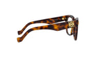 A pair of stylish tortoiseshell-framed glasses with a gold-colored logo on the temples.