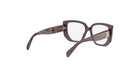 A pair of dark-colored, square-framed glasses with a gold-colored logo on the temples.