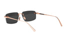 A pair of gold-colored sunglasses with dark lenses.