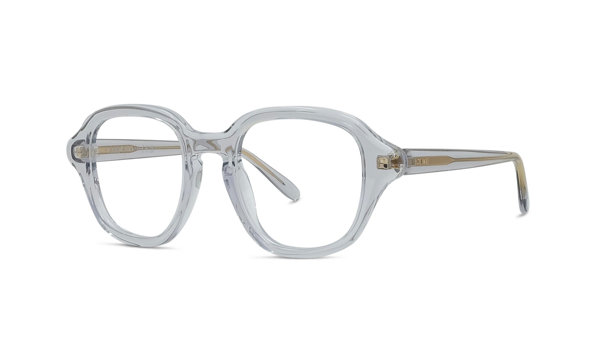 A pair of clear eyeglasses with gold-colored temples.