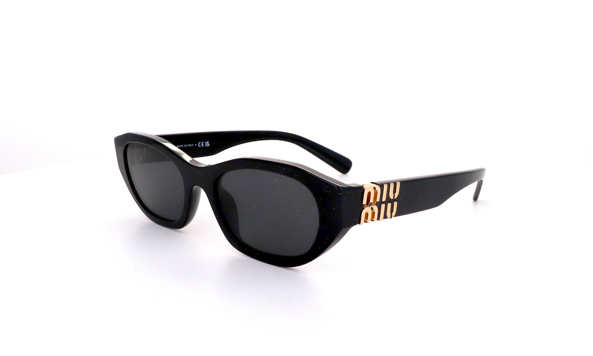 サングラス Miu Miu Nero Lenti Con Protezione Uv Lenti A Specchio. Miu Miu MU 04UV Nero - Occhiali da Vista 8056597669016