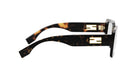A pair of sunglasses with a dark frame and a gold-colored logo on the temples.