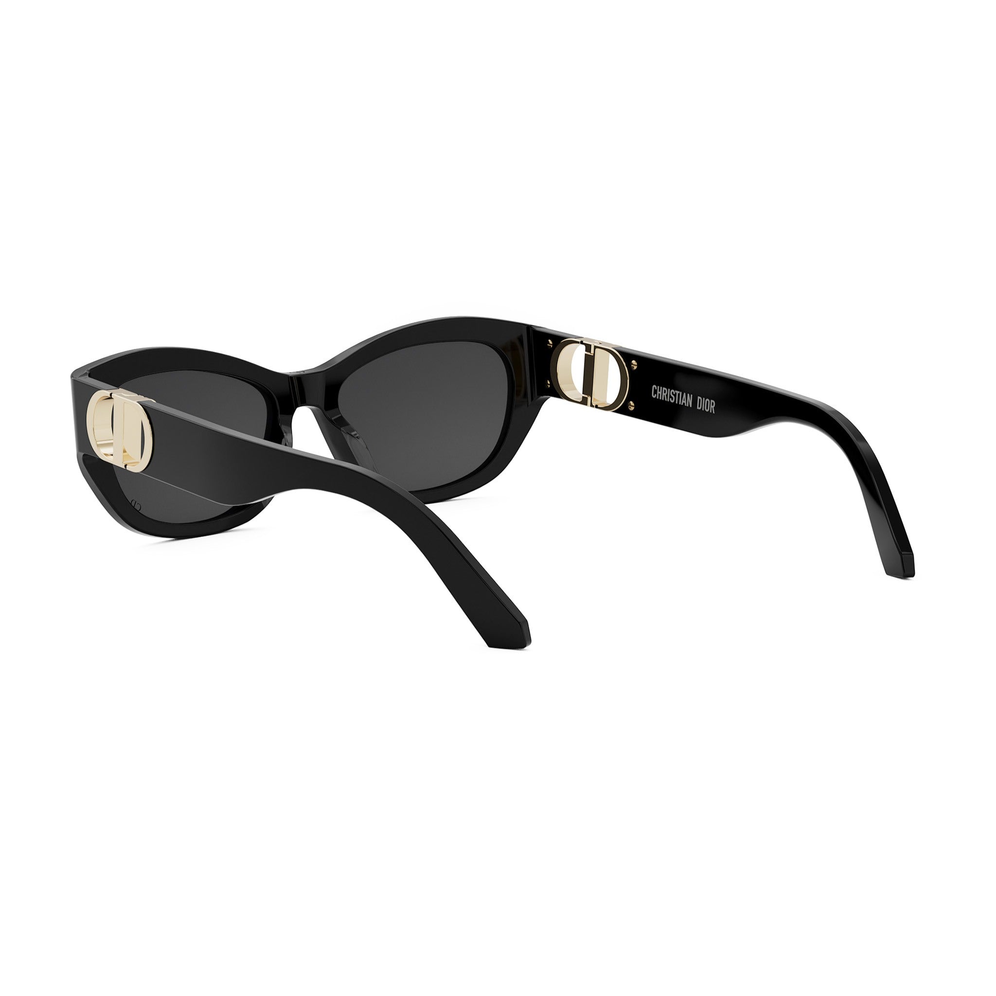 A pair of black sunglasses with gold accents, featuring the Dior logo on the frame.
