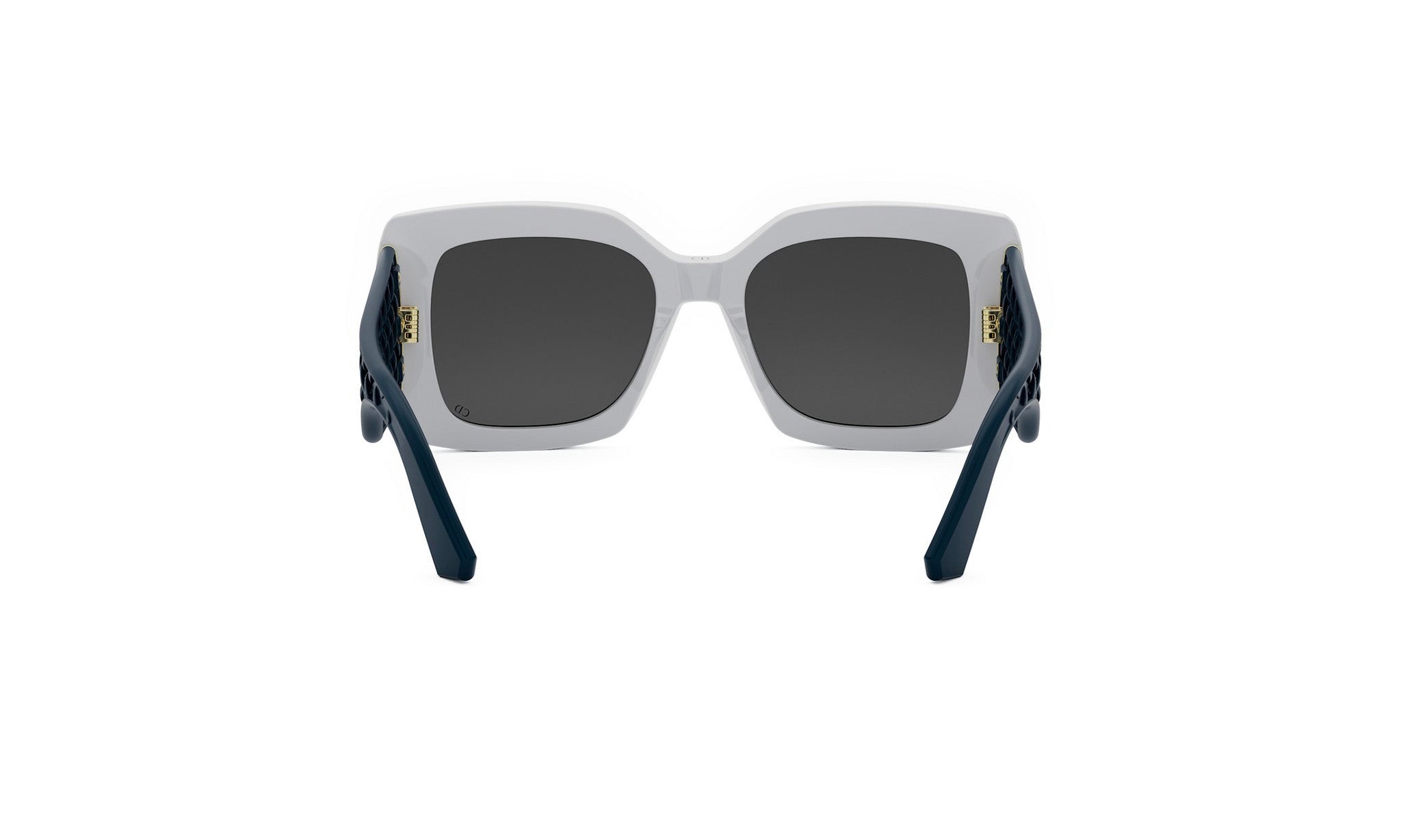 A pair of white and black sunglasses with dark blue frames.