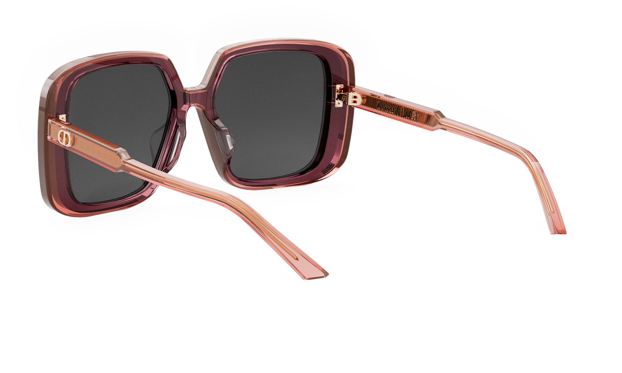 A pair of stylish sunglasses with dark lenses and a pink frame.