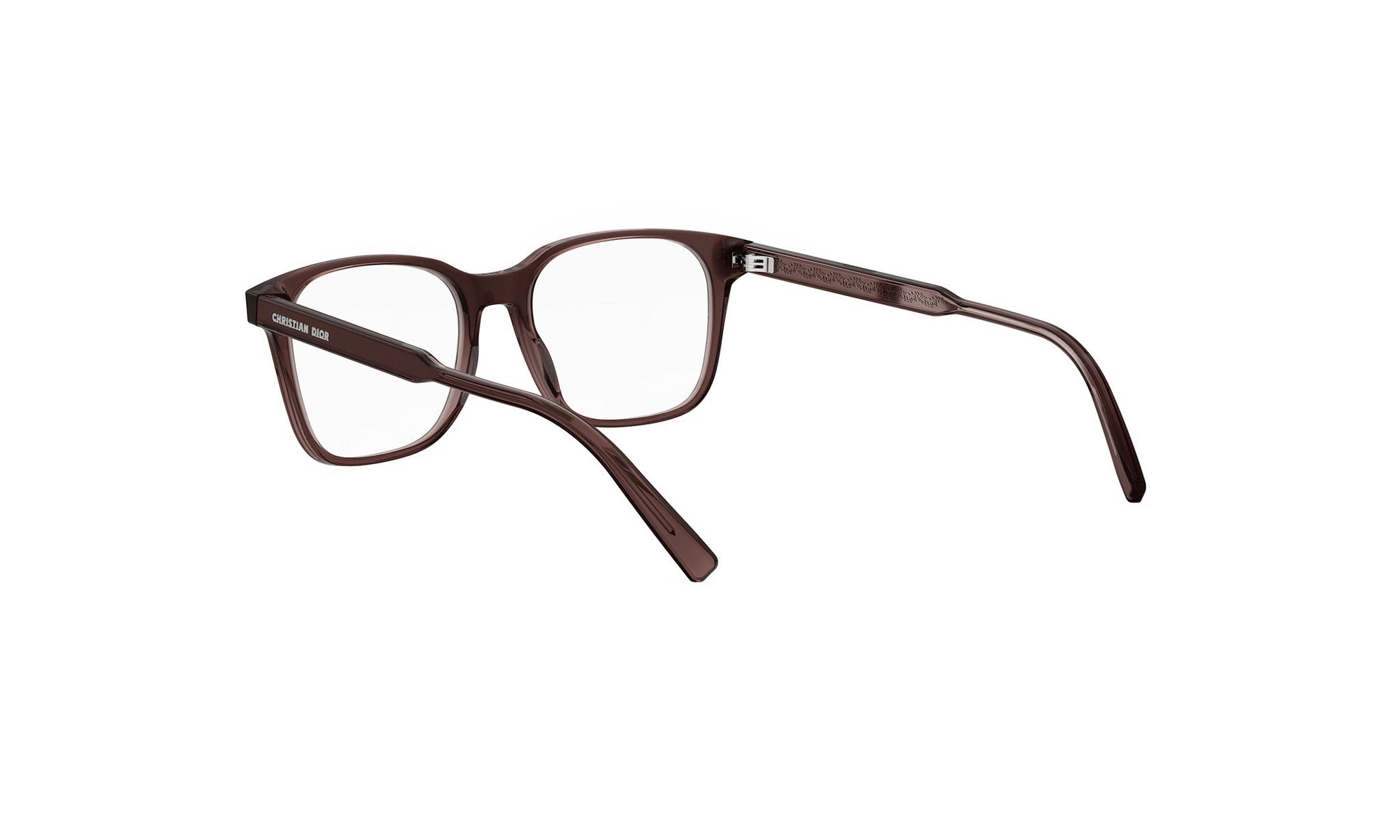 A pair of brown-framed glasses with clear lenses, positioned facing away from the camera.