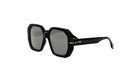 A pair of black sunglasses with a Fendi logo on the frame.