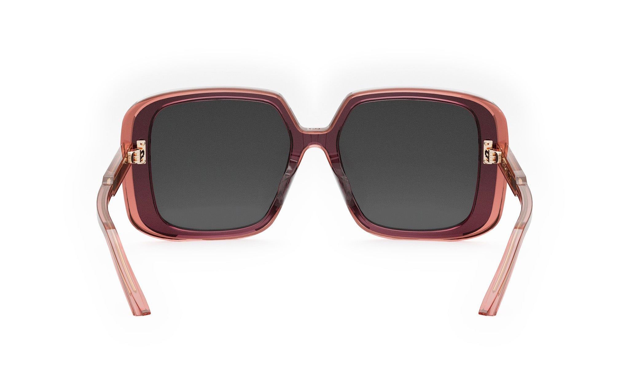 A pair of stylish sunglasses with dark lenses and a maroon frame.