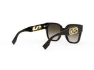 A pair of black sunglasses with gold lettering on the temples.