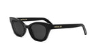 A pair of black cat-eye sunglasses with the brand name "Christian Dior" printed on the frame.