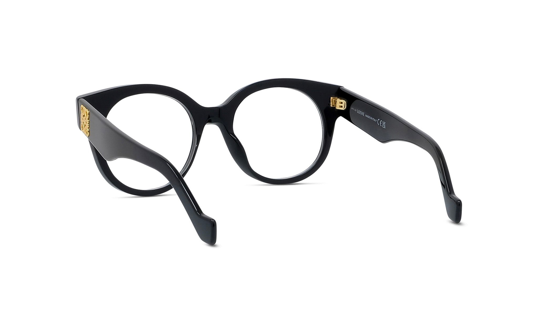 A pair of black-framed glasses with gold accents.