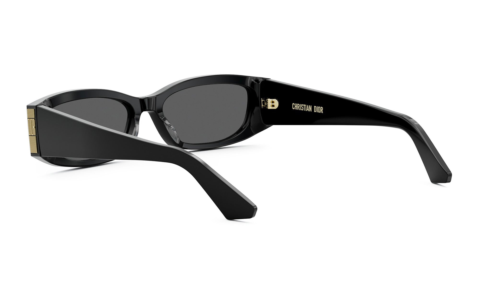 A pair of black sunglasses with gold accents, featuring the brand name "CHRISTIAN DOR" on the side.