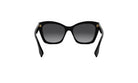 A pair of black cat-eye sunglasses with gold accents.