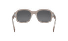 A pair of tan-colored sunglasses with dark lenses, positioned facing forward.