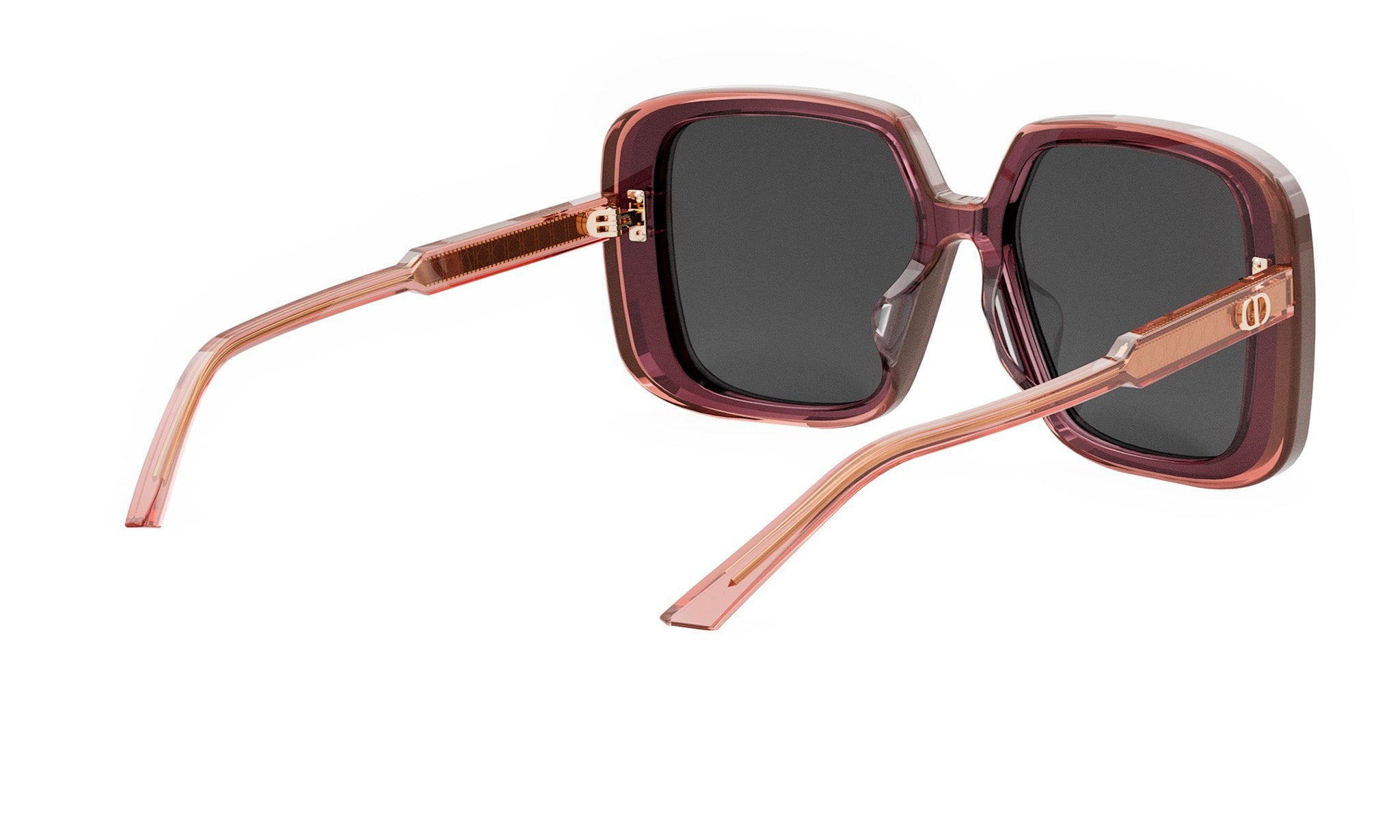A pair of stylish sunglasses with dark lenses and a pink frame.