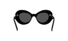 A pair of black, round sunglasses with dark lenses.