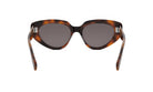 A pair of tortoiseshell sunglasses with dark lenses.