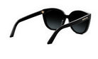 A pair of black sunglasses with the brand name "CHRISTIAN LUXE" visible on the frame.