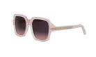 A pair of pink-framed sunglasses with the Christian Dior logo on the frame.