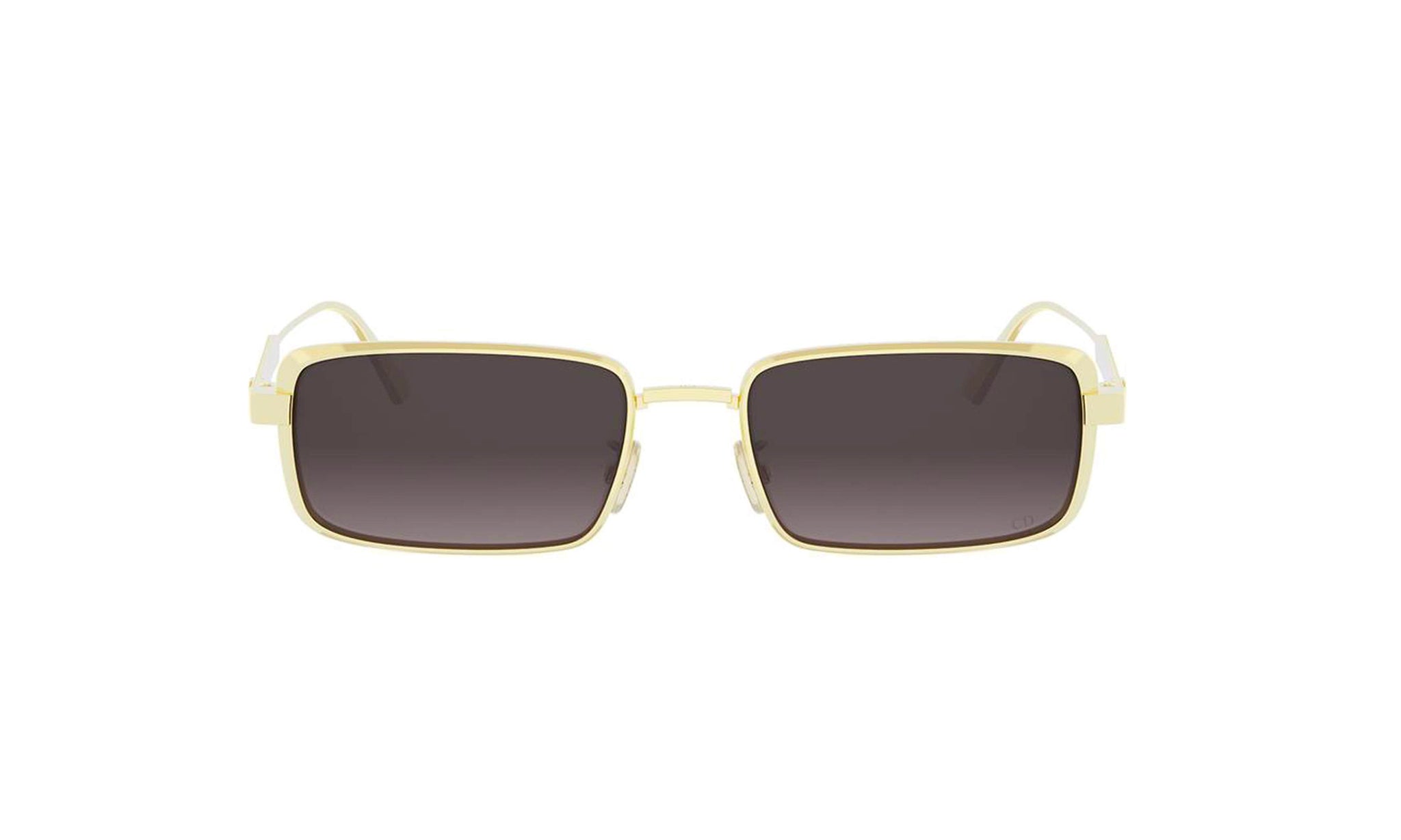 A pair of gold-framed sunglasses with dark lenses.