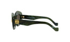 A pair of green-framed sunglasses with a gold logo on the side.