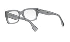 A pair of gray-framed glasses with the Fendi logo visible on the temples.