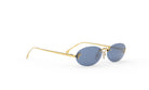 A pair of gold rimmed sunglasses with dark blue lenses is shown against a white background.