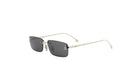 A pair of silver-framed sunglasses with dark lenses.