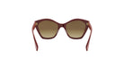 A pair of burgundy-colored cat-eye sunglasses with dark lenses and dark red frames.