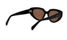 A pair of black cat-eye sunglasses with a brown lens.