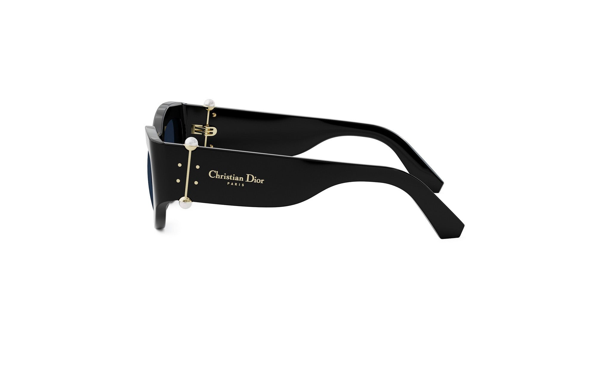 A pair of black sunglasses with gold accents and the logo of Christian Dior Paris.
