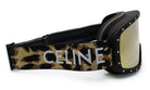 A pair of sunglasses with a leopard print strap and the word "Celine" printed on it.