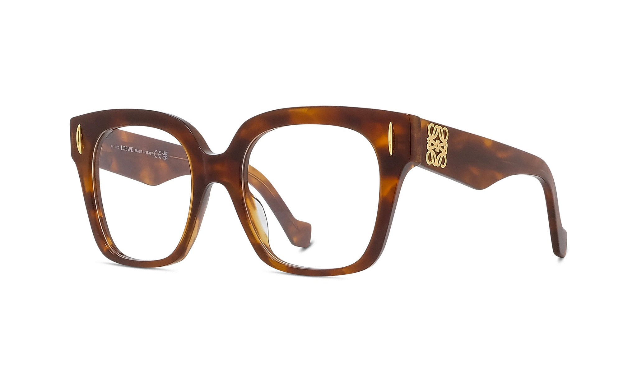 Brown framed glasses with a gold-colored accent on the temples.