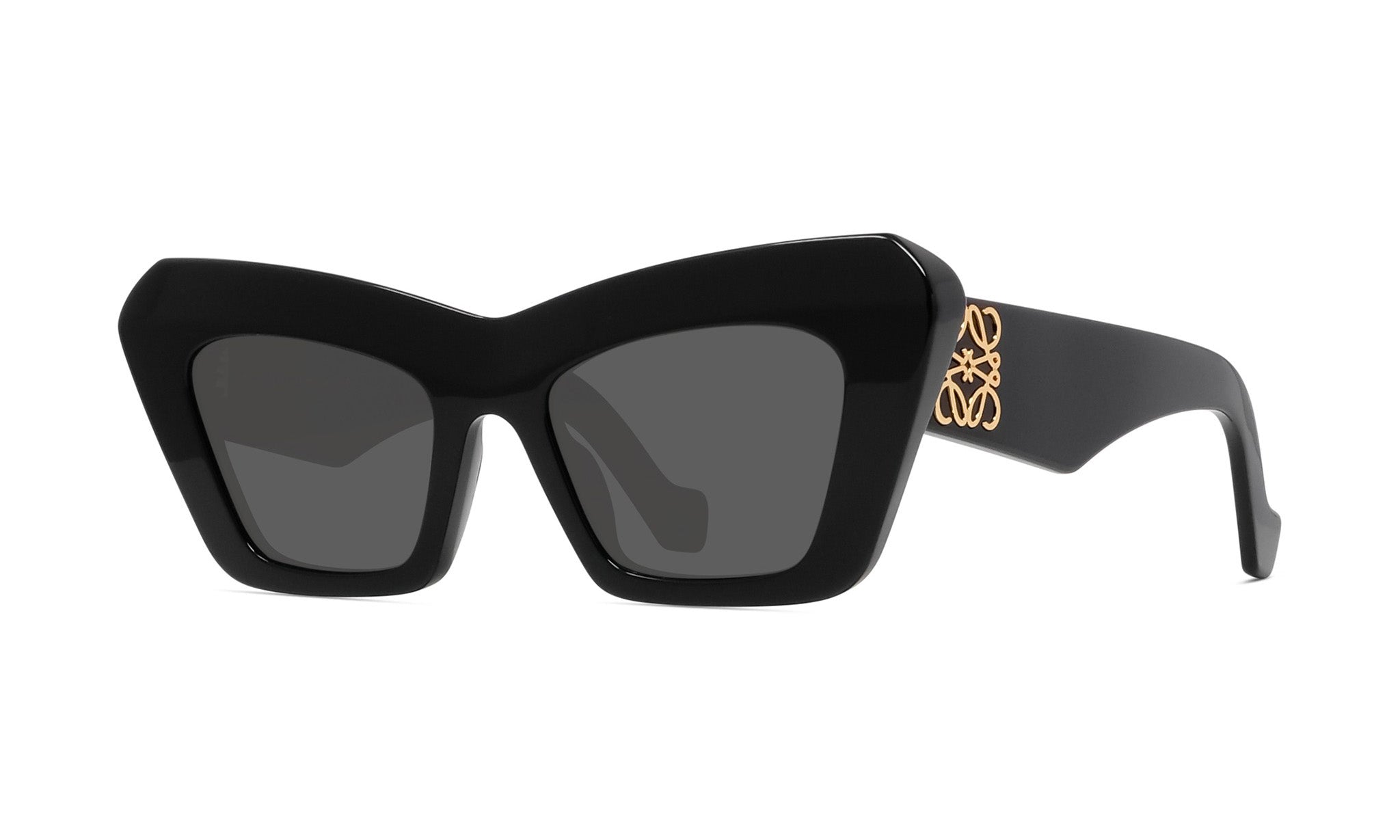 A pair of black cat-eye sunglasses with a gold logo on the frame.