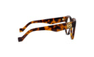 A pair of stylish tortoiseshell-framed glasses with a gold-colored logo on the temples.