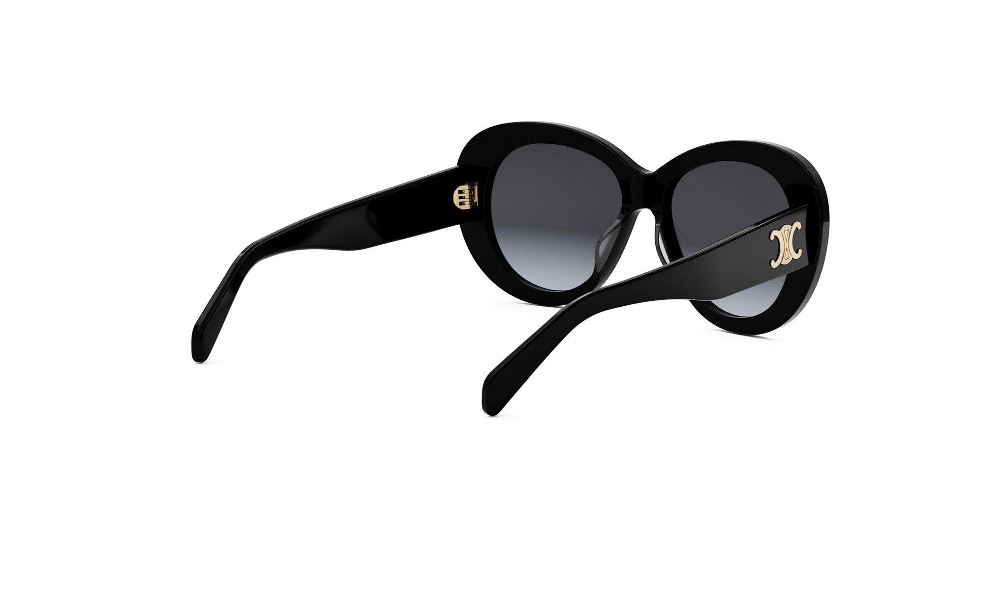 A pair of black sunglasses with gold accents, featuring a large "C" logo on the frame.