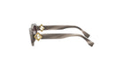 A pair of stylish sunglasses with a geometric pattern on the frame and gold-colored embellishments.