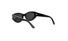 A pair of black cat-eye sunglasses with a gold logo on the frame.