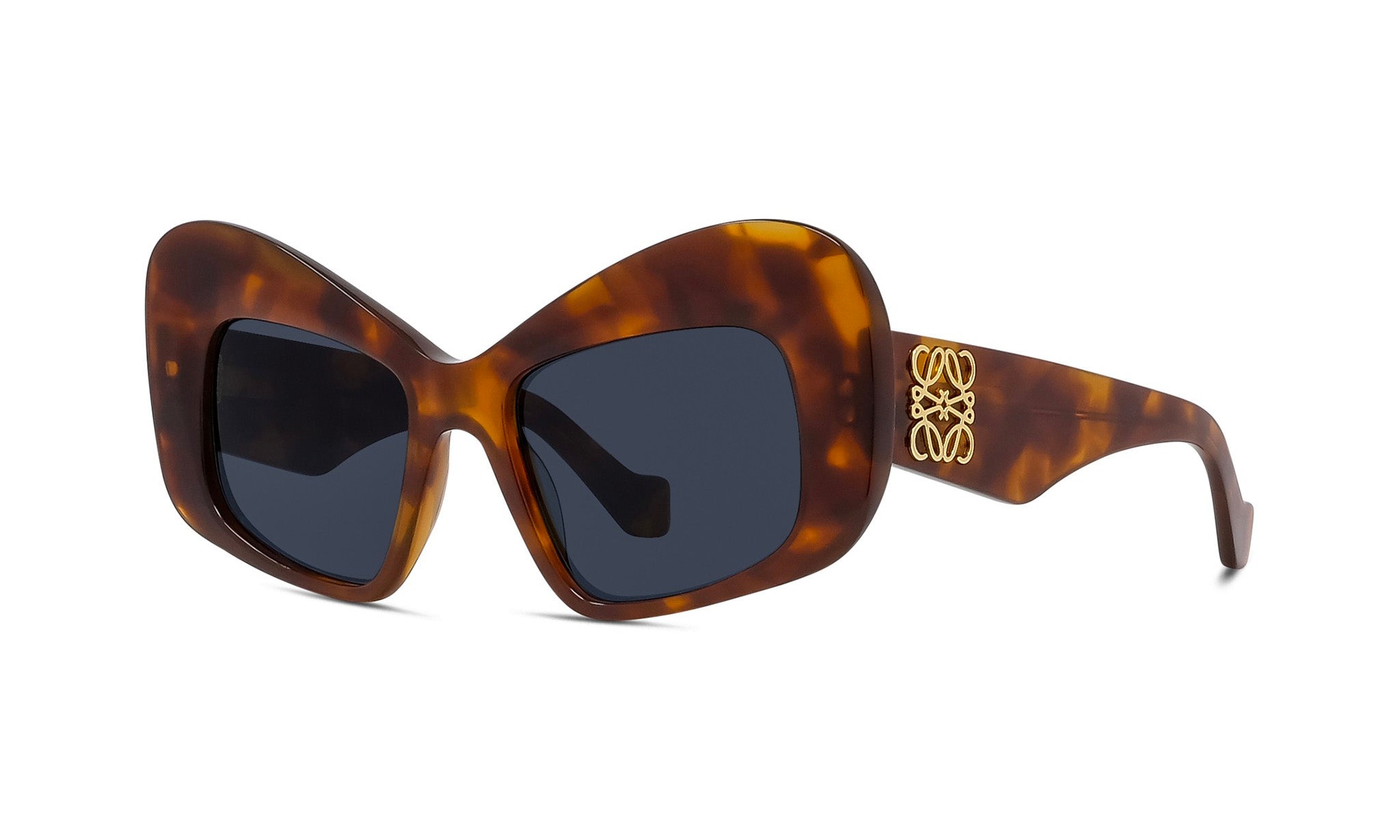 A pair of stylish sunglasses with a tortoiseshell frame and dark lenses.