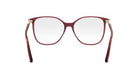A pair of red-tinted glasses with clear lenses, featuring a dark brown frame and a white background.