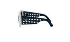 A pair of stylish sunglasses with a white frame and black perforated pattern on the arms.
