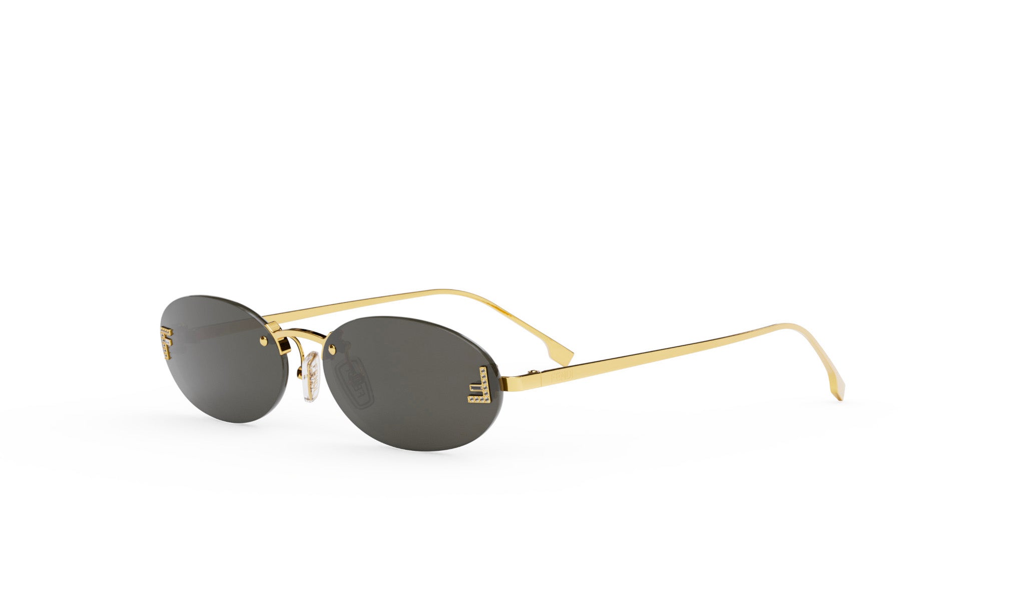 A pair of gold rimmed sunglasses with dark lenses.