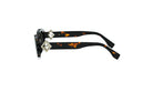 A pair of stylish sunglasses with a tortoiseshell frame and a black strap adorned with a geometric pattern.