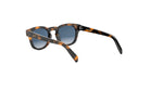 A pair of sunglasses with a tortoiseshell frame and dark blue lenses.